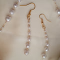 Set collana  ed orecchini pendenti di perle